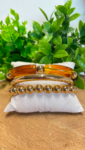 Trio de pulseras oro y ambar