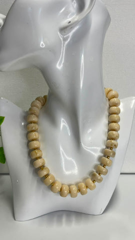 # 500-Collar rueditas hueso